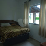 Casa à venda com 4 quartos, sendo 1 suíte,  no condomínio Village da Serra, Araçoiaba da Serra - SP