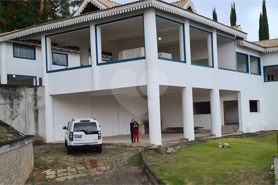 Casa à venda com 4 suítes no condomínio Suíça da Cantareira, Mairiporã - SP