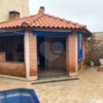 Casa Térrea com Acabamento em Tijolo Aparente e Quintal Amplo - Próximo ao Shopping Iguatemi