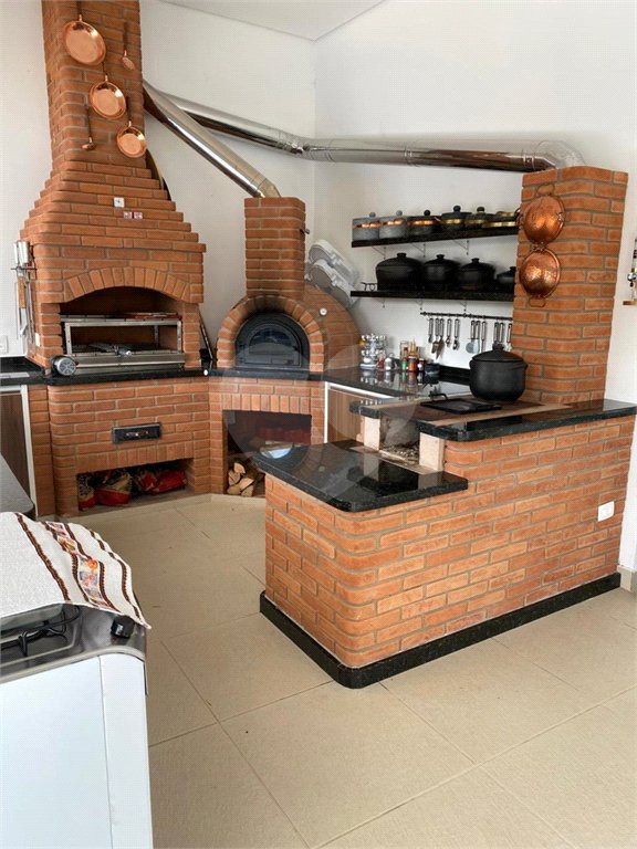 Casa à venda com 4 suítes no condomínio Reserva Ibirapitanga Ii, Santa Isabel - SP