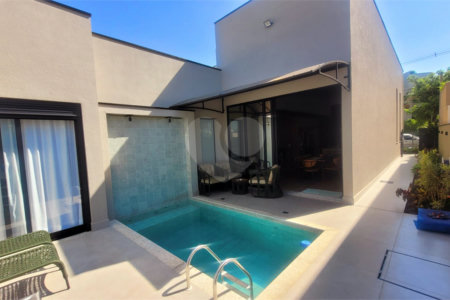 Casa à venda com 4 suítes no condomínio Sta Morriz, Campinas - SP