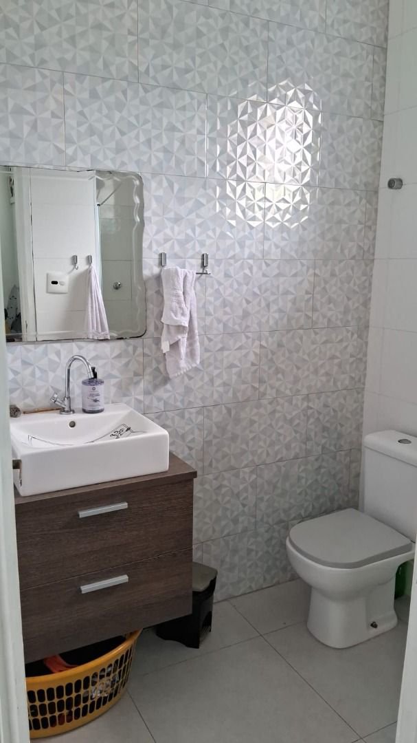 Sobrado com 3 dormitórios à venda, 150 m² por R$ 780.000,00 - Estuário - Santos/SP