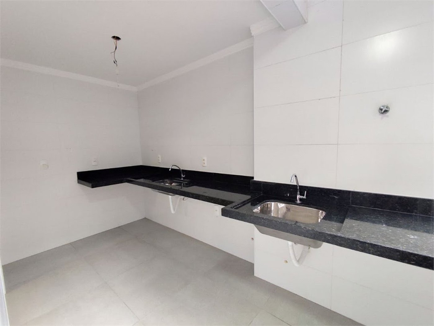 Apartamento com 2 dormitórios à venda, 65 m² por R$ 444.000,00 - Gonzaga - Santos/SP