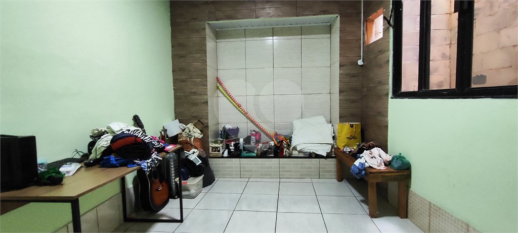 Casa à venda com 5 quartos, sendo 3 suítes, no condomínio Village Texeira Campos, Rio de Janeiro - RJ