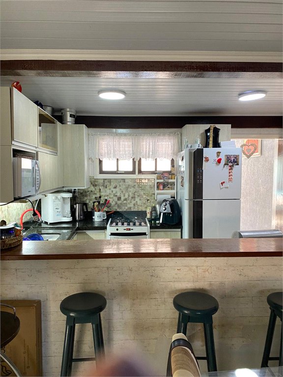 Casa em condomínio à venda com 3 quartos, sendo 2 suítes, em Caravelas, Armação dos Búzios, RJ
