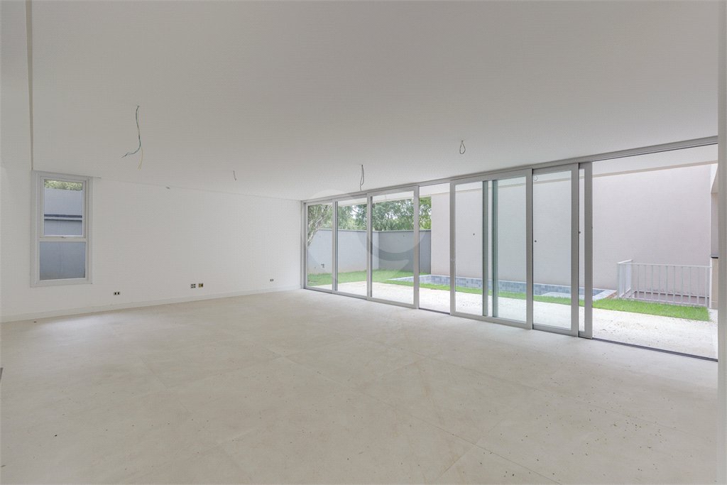 Casa à venda com 4 suítes no condomínio Garda, São Paulo - SP