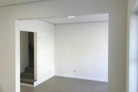 Casa com 3 dormitórios à venda, 116 m² por R$ 690.000,00 - Gonzaga - Santos/SP