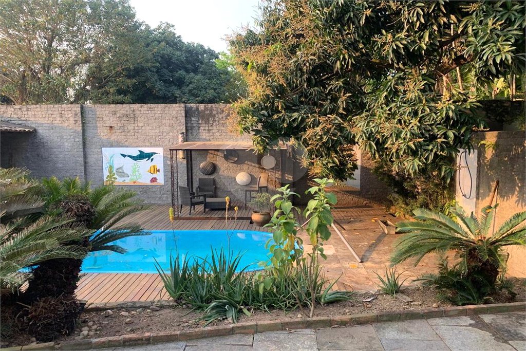 Casa à venda com 4 quartos, sendo 3 suítes, no condomínio Mirante da Barra, Rio de Janeiro - RJ