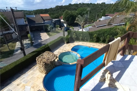 Casa à venda com 4 suítes no condomínio Aruã, Mogi das Cruzes - SP