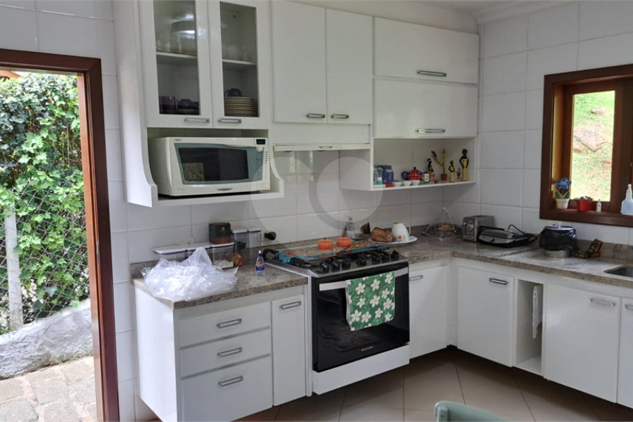 Casa à venda com 6 quartos, sendo 4 suítes, no condomínio Alpes da Cantareira, Mairiporã - SP