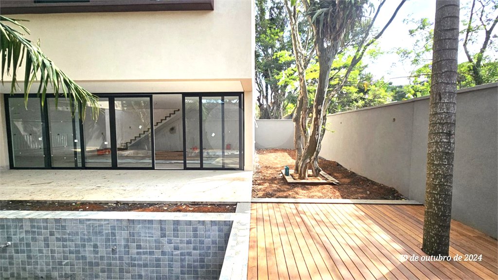 Casa à venda com 4 suítes no condomínio Garda, São Paulo - SP