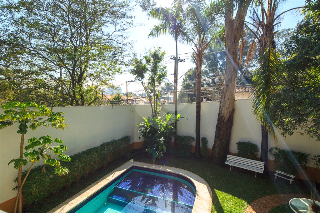 Casa à venda com 4 suítes no condomínio Vila Alba, São Paulo - SP