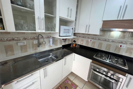 Apartamento com 2 dormitórios à venda, 64 m² por R$ 360.000,00 - Jardim Praiano - Guarujá/SP