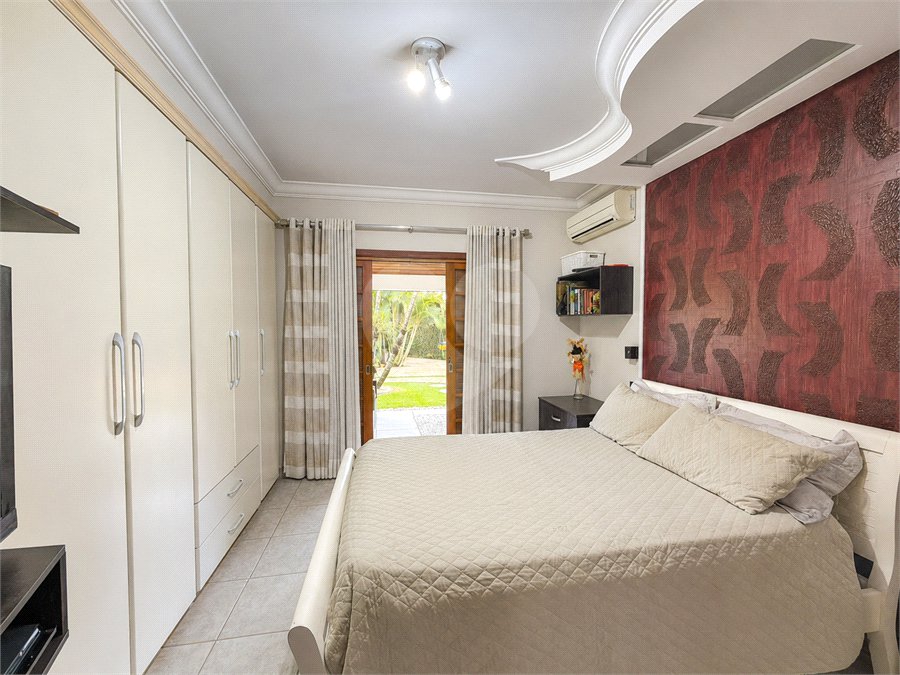 Casa à venda com 5 suítes no condomínio Parque Village Castelo, Itu - SP
