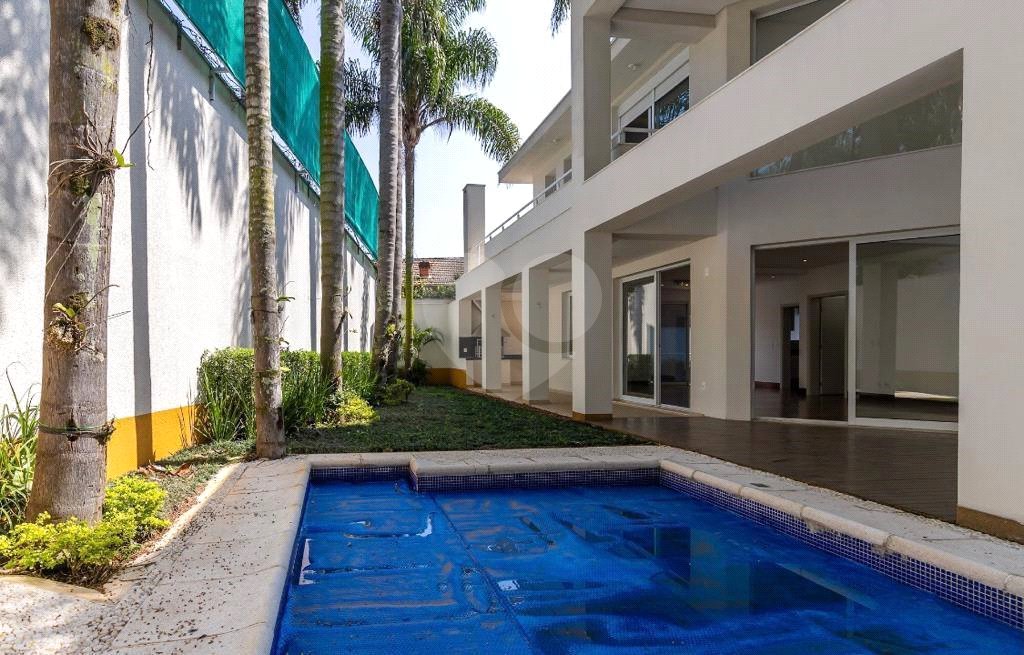 Casa à venda com 4 suítes no condomínio Vila Alba, São Paulo - SP