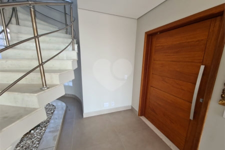 Casa à venda com 3 suítes no condomínio Estância Marambaia, Vinhedo - SP