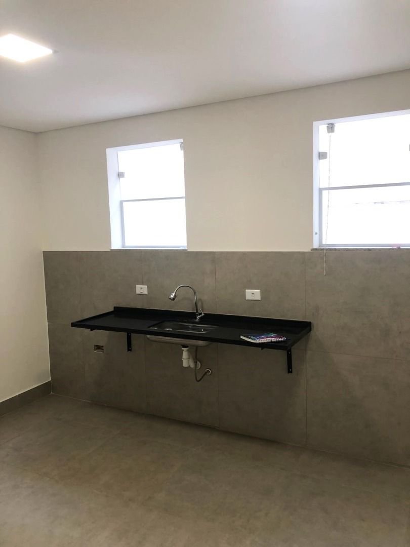 Casa com 3 dormitórios à venda, 116 m² por R$ 690.000,00 - Gonzaga - Santos/SP