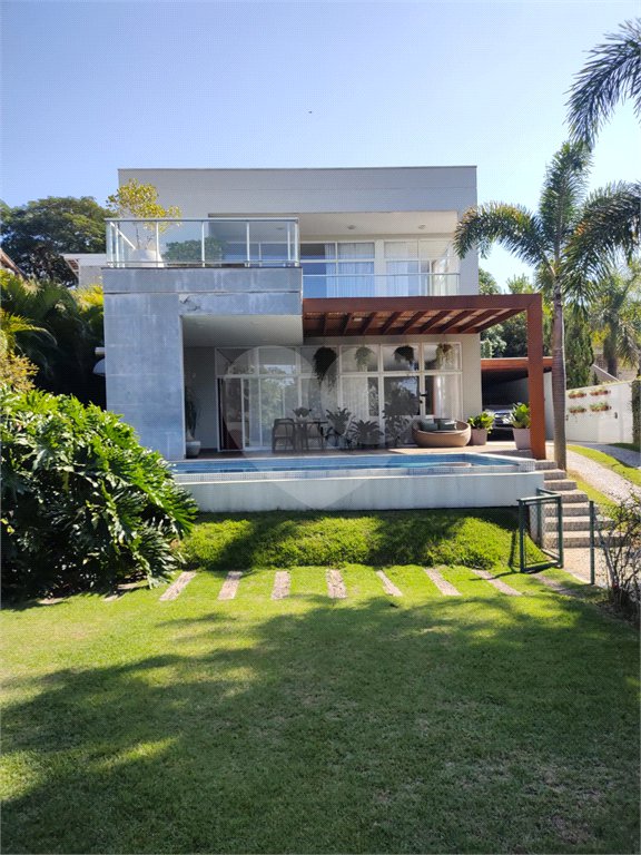 Casa à venda com 4 quartos, sendo 3 suítes, no condomínio Estância Marambaia, Vinhedo - SP