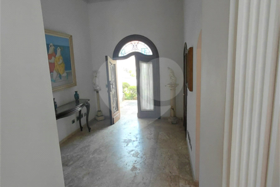 Casa à venda com 4 suítes no condomínio Ville Bourghese, São Paulo - SP