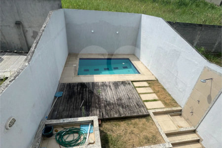 Casa à venda com 3 quartos, sendo 1 suíte, no condomínio Residencial Green Ville, Rio de Janeiro - RJ