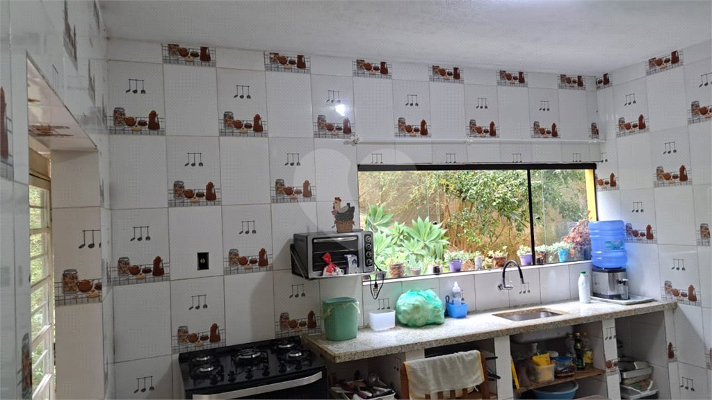 Casa à venda com 3 quartos, sendo 1 suíte, no condomínio Alpes da Cantareira, Mairiporã - SP