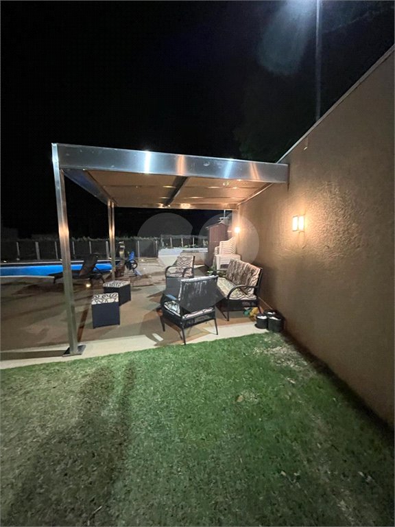 Casa à venda com 4 suítes no condomínio Figueira Garden, Atibaia - SP