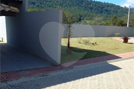 Casa à venda com 3 suítes no condomínio Residencial Marchant Buarque, Atibaia - SP