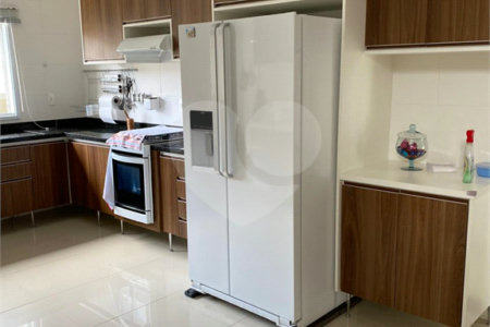 Casa à venda com 4 suítes no condomínio Reserva Ibirapitanga Ii, Santa Isabel - SP
