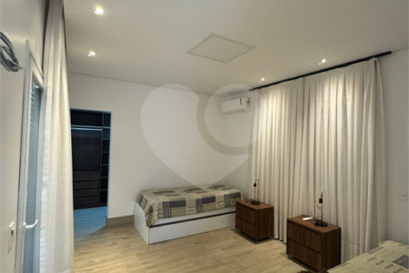 Casa à venda com 4 suítes no condomínio Itaporã, Atibaia - SP