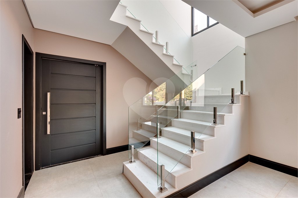 Casa à venda com 4 suítes no condomínio Reserva Robélia, São Paulo - SP