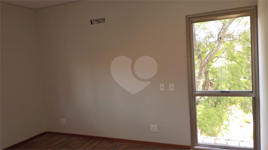 Casa à venda com 4 suítes no condomínio Estância Marambaia, Vinhedo - SP