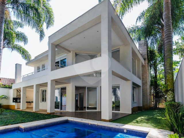 Casa à venda com 4 suítes no condomínio Vila Alba, São Paulo - SP
