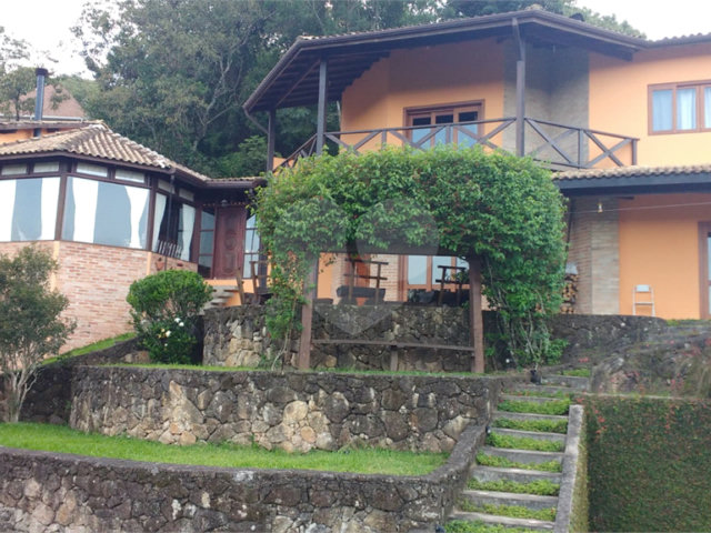 Casa à venda com 4 suítes no condomínio Parque Petrópolis 4 Secção, Mairiporã - SP