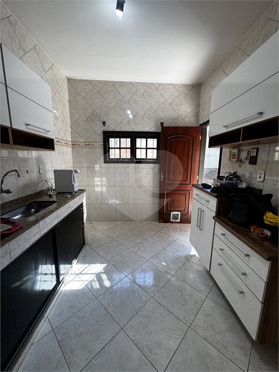 Casa à venda com 3 quartos, sendo 1 suíte, no condomínio Village da Posse, Rio de Janeiro - RJ