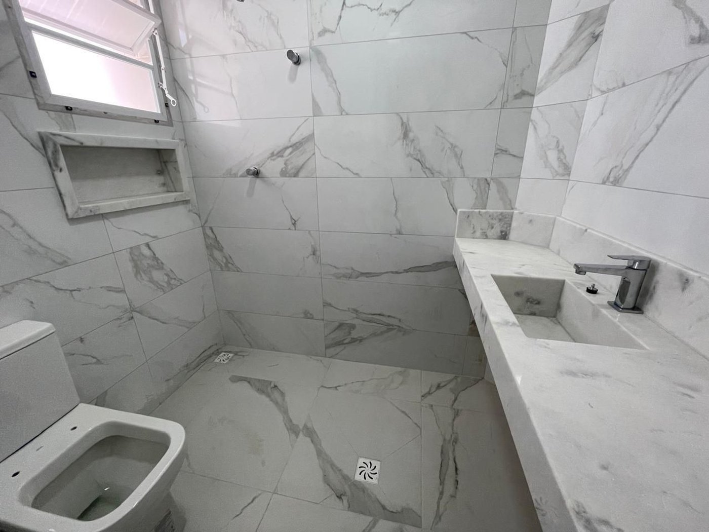 Casa com 4 dormitórios à venda, 234 m² por R$ 1.650.000,00 - Embaré - Santos/SP