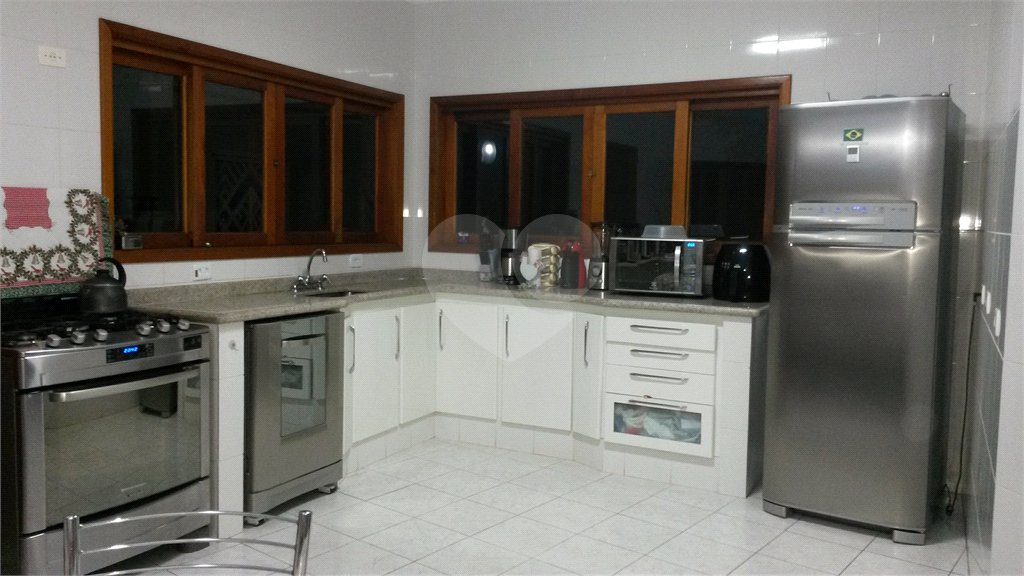 Casa à venda com 4 quartos, sendo 2 suítes, no condomínio Alpes da Cantareira, Mairiporã - SP