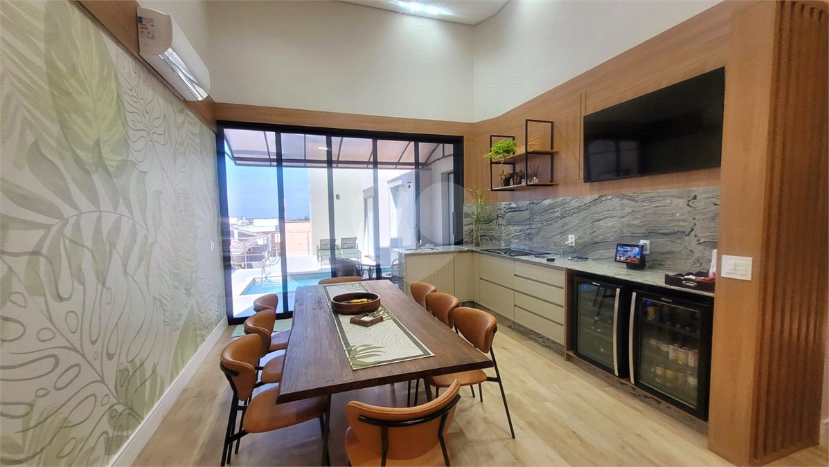 Casa à venda com 4 suítes no condomínio Sta Morriz, Campinas - SP