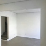 Casa com 3 dormitórios à venda, 116 m² por R$ 690.000,00 - Gonzaga - Santos/SP