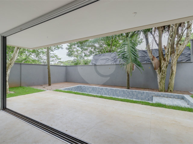 Casa à venda com 4 suítes no condomínio Garda, São Paulo - SP