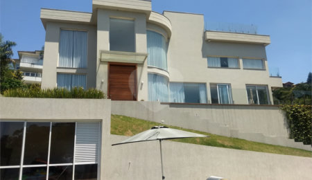 Casa à venda com 4 suítes no condomínio Suíça da Cantareira, Mairiporã - SP