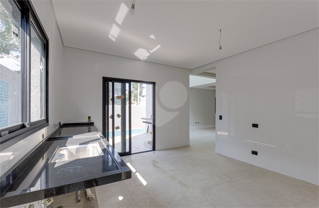 Casa à venda com 4 suítes no condomínio Reserva Robélia, São Paulo - SP