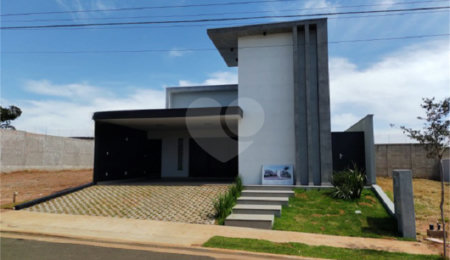 Casa à venda com 4 suítes no condomínio Parque Faber IV, São Carlos - SP