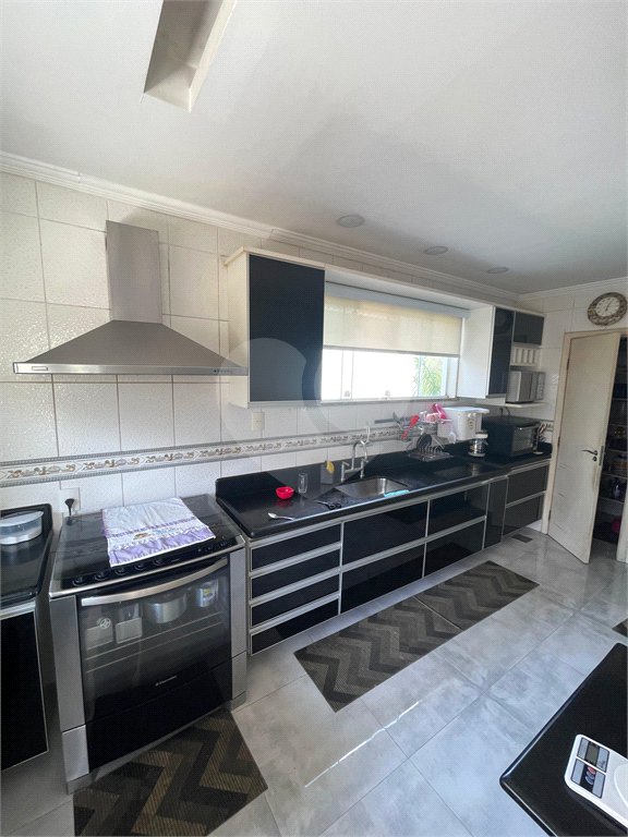 Casa à venda com 5 quartos, sendo 1 suíte, no condomínio Residencial Green Ville, Rio de Janeiro - RJ