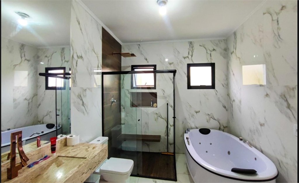 Casa à venda com 4 suítes no condomínio Residencial Vila Real, Bragança Paulista - SP