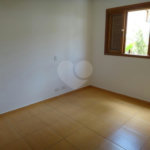 Casa à venda ou para alugar com 4 quartos, sendo 2 suítes, no condomínio Vila Hípica, São Paulo - SP
