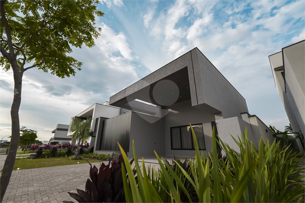 Casa à venda com 4 suítes no condomínio Alphaville Nova Esplanada 4, Votorantim - SP