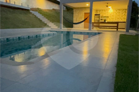 Casa à venda com 4 suítes no condomínio Portal Ouro Verde, Atibaia - SP