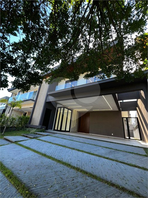 Casa à venda com 4 suítes no condomínio Residencial Mosaico da Serra, Mogi das Cruzes - SP
