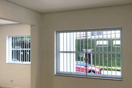 Casa com 3 dormitórios à venda, 116 m² por R$ 690.000,00 - Gonzaga - Santos/SP