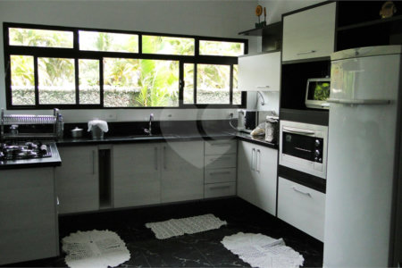 Casa à venda com 8 quartos, sendo 6 suítes,  no condomínio Acapulco, Guarujá - SP